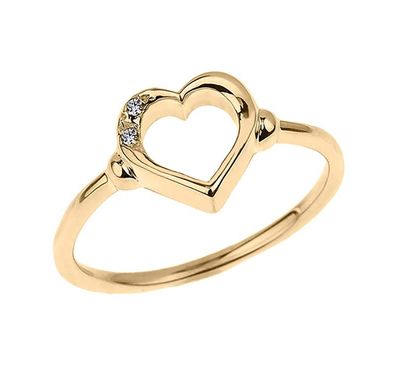 anillo de oro amarillo con dos diamantes en forma de corazón